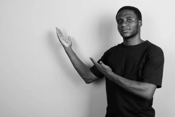 Studio Shot Young African Man Wearing Black Shirt Gray Background — Stock Photo, Image