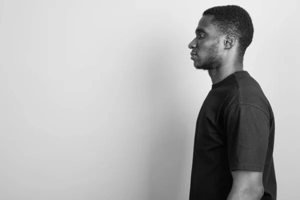 Studio Shot Young African Man Wearing Black Shirt Gray Background — Stock Photo, Image