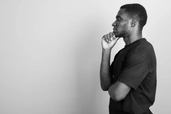 Studio Shot Young African Man Wearing Black Shirt Gray Background — Stock Photo, Image