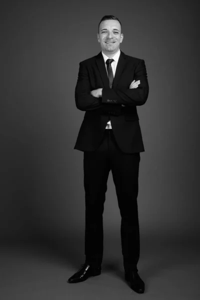 Studio Shot Businessman Wearing Suit Gray Background Black White — Stock Photo, Image