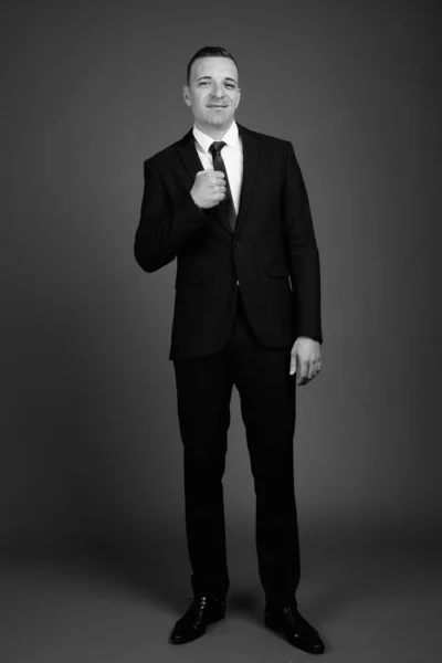 Studio Shot Businessman Wearing Suit Gray Background Black White — Stock Photo, Image