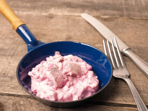 Tasty Herring Beet Root Sauce Iron Pan Wooden Table — Stock Photo, Image