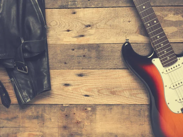 Vintage Electric Guitar Leather Jacket Rustic Wooden Plank Vintage Flat — Stock Photo, Image