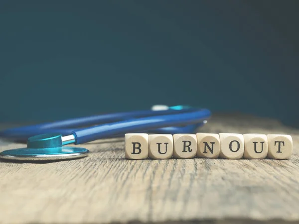 Word Burnout Small Wooden Blocks Stethoscope Wooden Table Medical Health — Stock Photo, Image