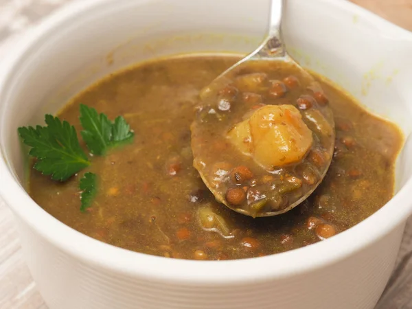 Tasty soup of green lentils — Stock Photo, Image