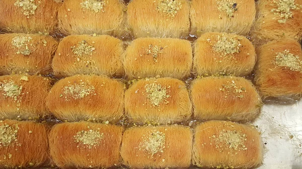 Delicious kadayif sweet with green pistachio nuts