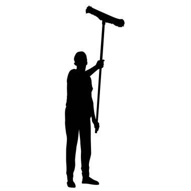 Pencereleri silen adam silueti