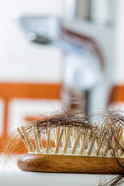 Hairbrush with hair — Stock Photo, Image