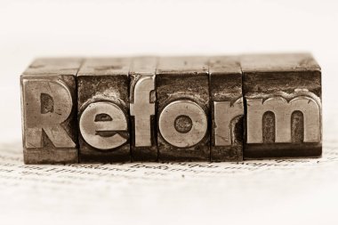 reform written in lead letters clipart