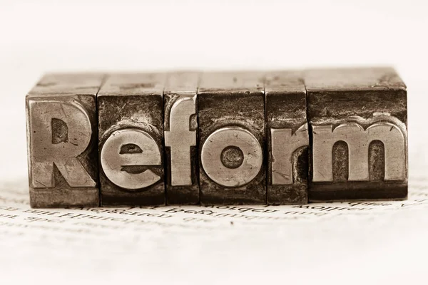 Reform written in lead letters — Stock Photo, Image