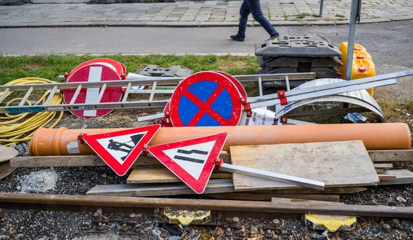 Road construction site. construction site signs are lying around — Stock Photo, Image
