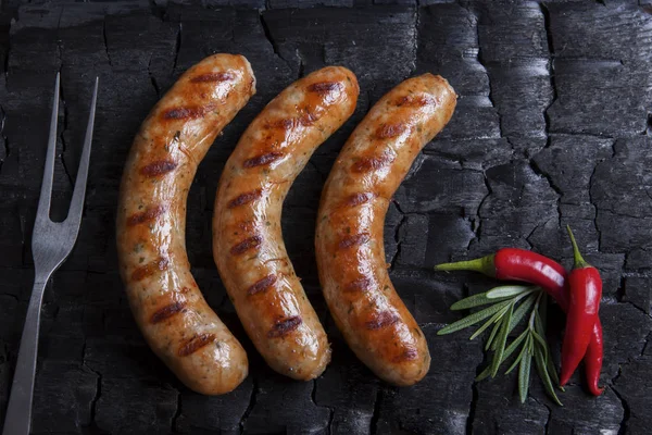 Grilled Sausages Black Background Charcoal Barbecue Grill — Stock Photo, Image