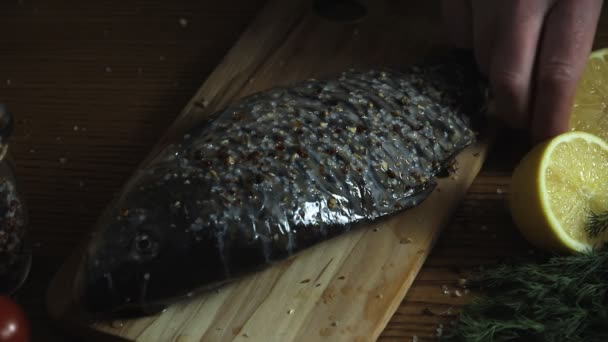 Raw Carp Fish Wooden Board Squeeze Lemon Cooking Process — Stock Video