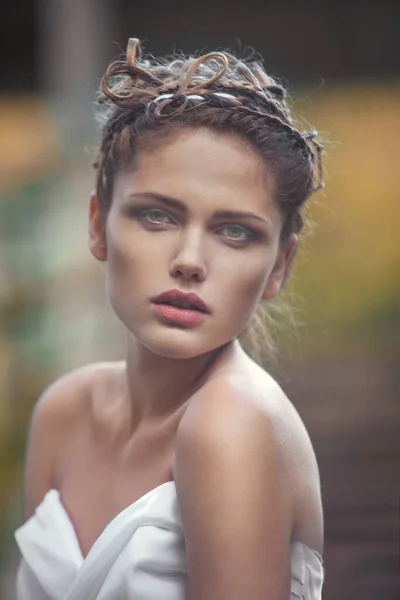 Sensual close up outdoor portrait of a caucasian girl with freckles.