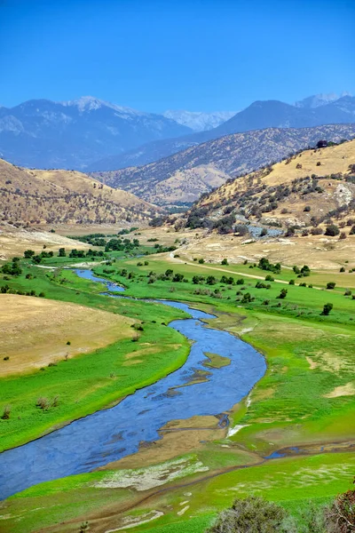 Mountain river valley landscape. River valley in mountains.