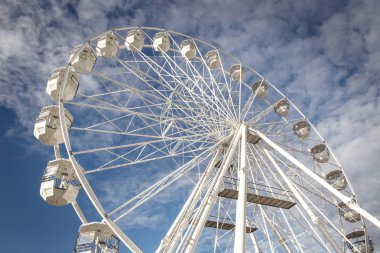 ferris wheel in Bournemouth sea side town in england clipart