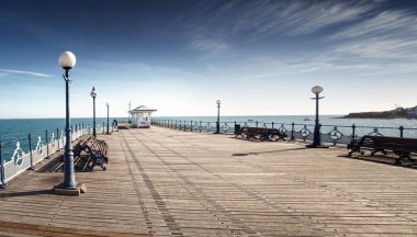 swanage pier plaklar ile sürü gösterilen bir ileti ile oyulmuş
