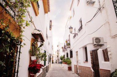 street and houses of old town in almunecar province of Granada in spain clipart