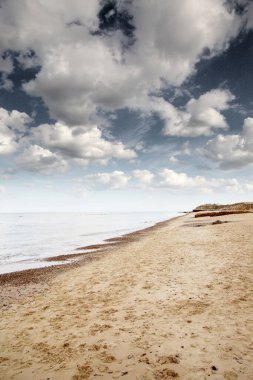Norfolk Kuzey Denizi kıyısındaki Happisburgh kumsalının deniz manzarası 