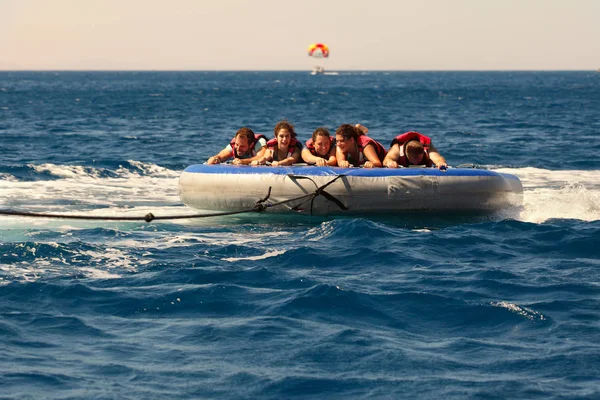 Happy people on water attractions — Stock Photo, Image