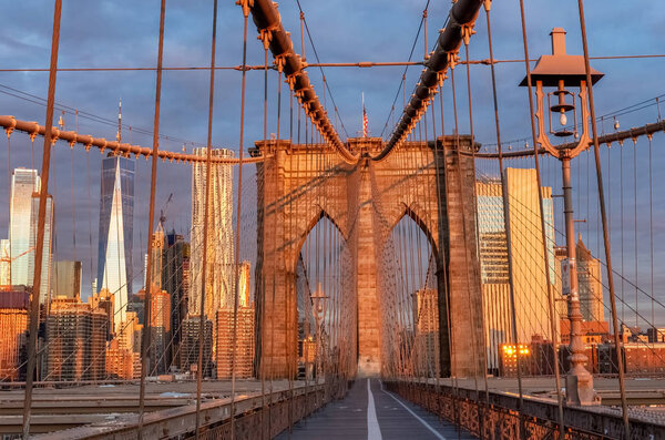 Brooklyn Bridge during sunrise in New York, USA