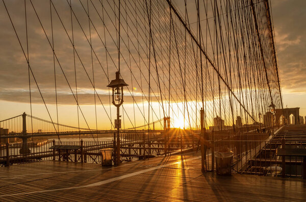 Brooklyn Bridge during sunrise in New York, USA