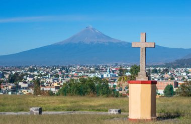 Popocatepetl volcano, Mexico. View from Church of Virgin of the remedies in Cholula clipart