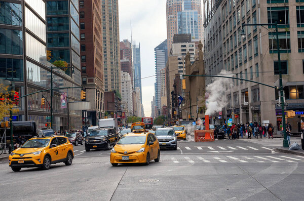 New York, USA - November1, 2018: Yellow NYC taxi cab on street