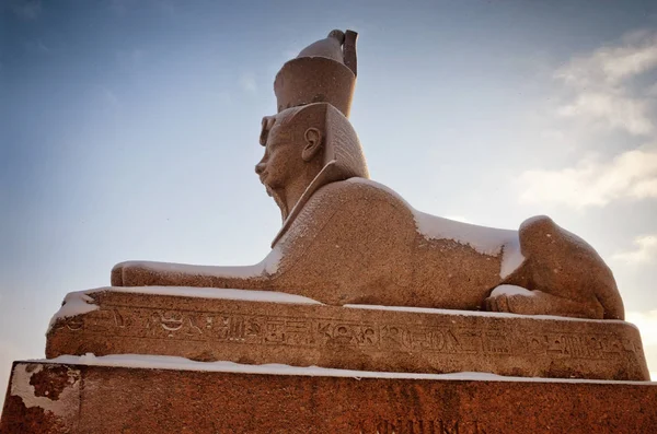 Authentic antique Egyptian sphynx on quay of the Neva river in Saint Petersburg, Russia.