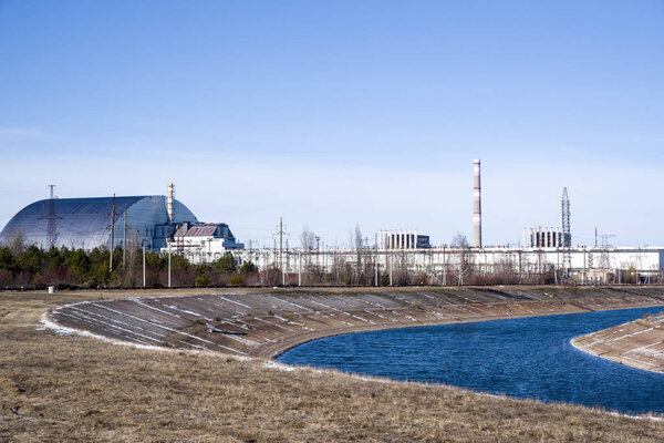 Chernobyl Nuclear Power Plant, fourth reactor and its enclosing sarcophagus in Chernobyl Exclusion Zone, Ukraine