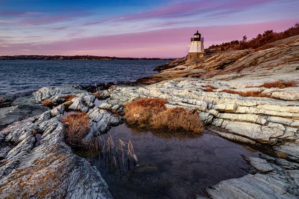 Old lighthouse at sunset . Castle Hill Lighthous. Newport, Rhode Island, USA