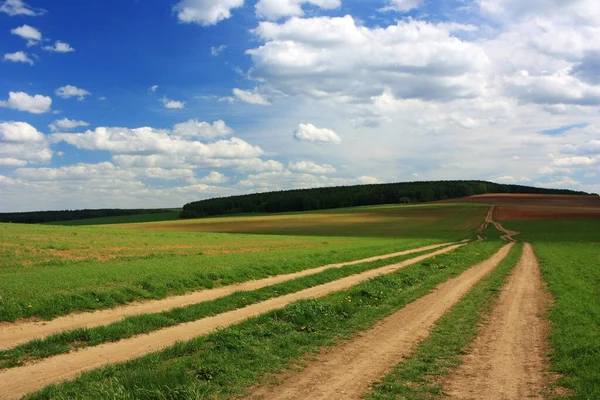 Estrada Terra Sob Céu Azul — Fotografia de Stock