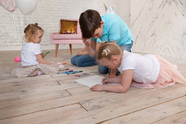 Children draw on floor. Children's party, merry party
