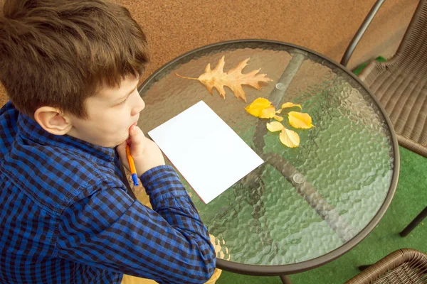 Boy Writing Something Boy Doing Homework Outdoors Boy Drawing Paper — Stock Photo, Image