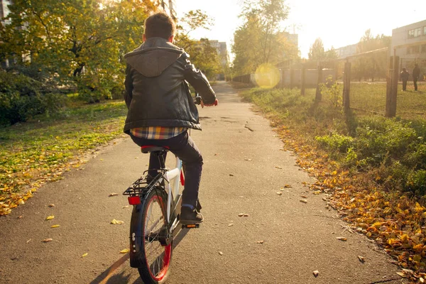 Happy boy ride the bicycle