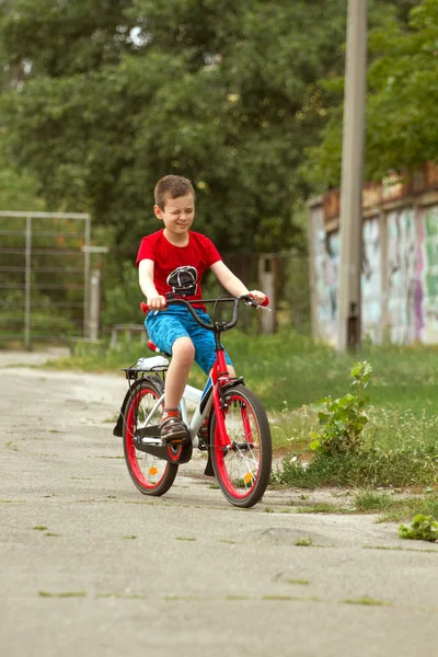 Happy boy ride the bicycle