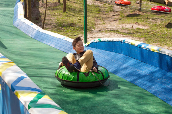 Happy boy with tube