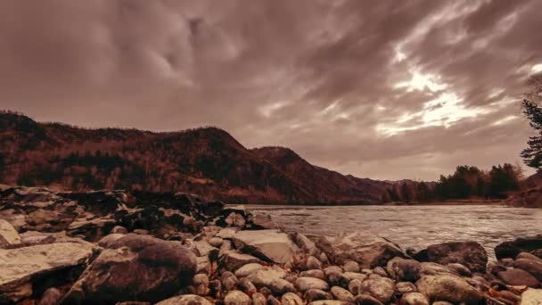 Time lapse shot of a river near mountain forest. Huge rocks and fast clouds movenings. Horizontal slider movement — Stock Video