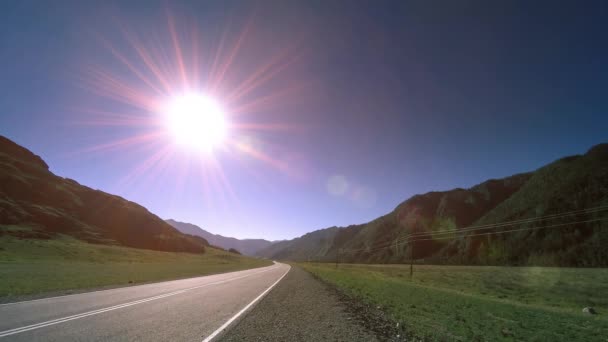 Mountain road timelapse at the summer or autumn sunset sunrise time. Wild nature and rural field. — Stock Video