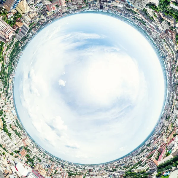 Aerial city view with crossroads and roads, houses, buildings, parks and parking lots. Sunny summer panoramic image — Stock Photo, Image