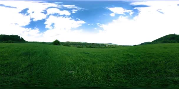 360 VR of a beautiful mountain meadow timelapse at the summer or autumn time. Clouds, green grass and sun rays. — Stock Video