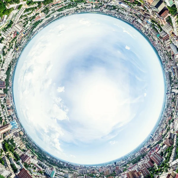 Aerial city view with crossroads and roads, houses, buildings, parks and parking lots. Sunny summer panoramic image — Stock Photo, Image