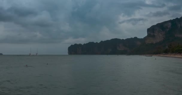 Time lapse of rain clouds over beach and sea landscape with boats. Tropical storm in ocean. — Stock Video