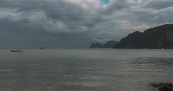 Time lapse of rain clouds over beach and sea landscape with boats. Tropical storm in ocean. — Stock Video