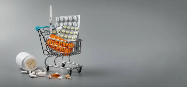 Farmacia Carrito Compras Con Pastillas Sobre Fondo Gris Con Espacio — Foto de Stock