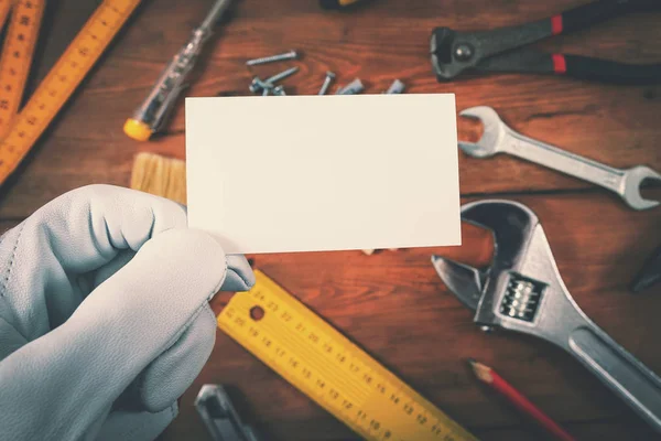 House construction and repair services - worker holding blank bu — Stock Photo, Image