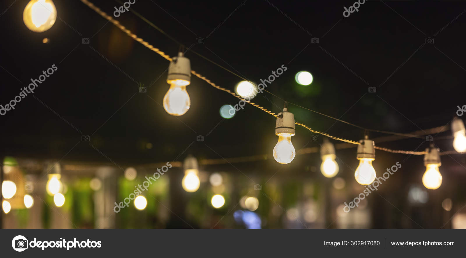 Party String Lights Hanging Over Outdoor Restaurant Terrace