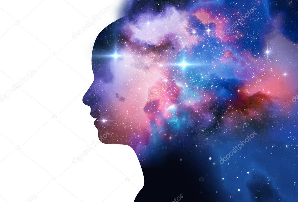 silhouette of virtual human with aura chakras on space nebula 3d