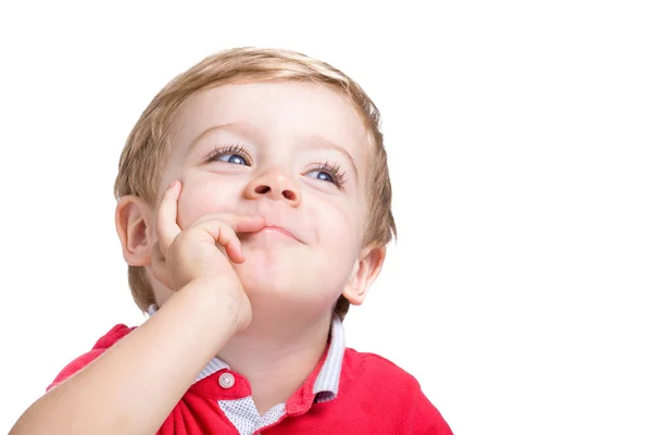 Entzückender Kleiner Junge Denkt Auf Weißem Hintergrund — Stockfoto