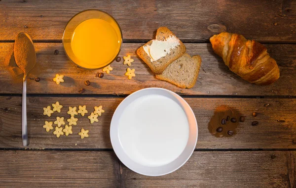 Top view of breakfast on wooden table Stock Picture